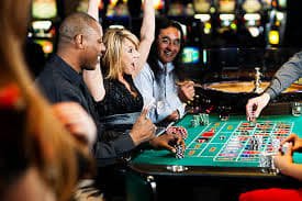Live roulette wheel and betting interface Red Tiger live roulette wheel with professional studio lighting